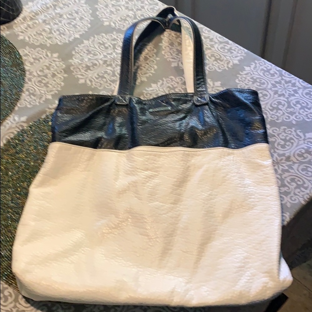Black/white leather tote by red marcecko